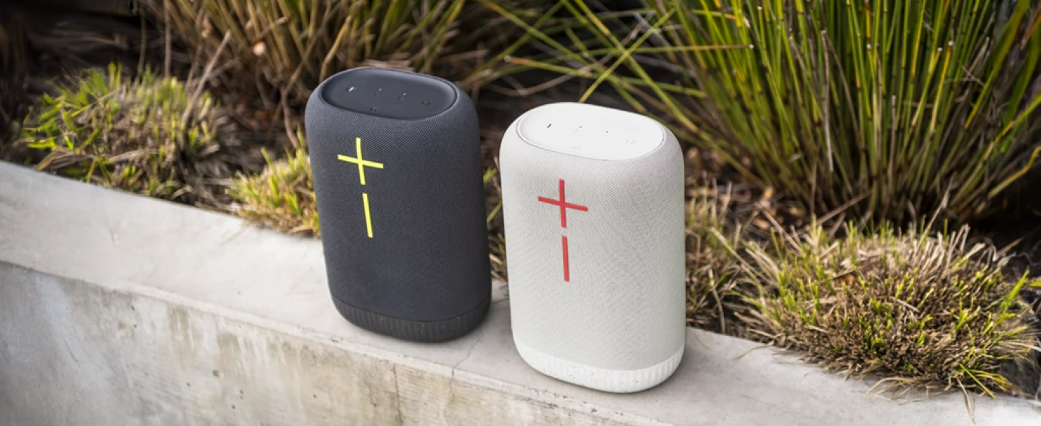 two epicboom wireless portable speakers in black and white